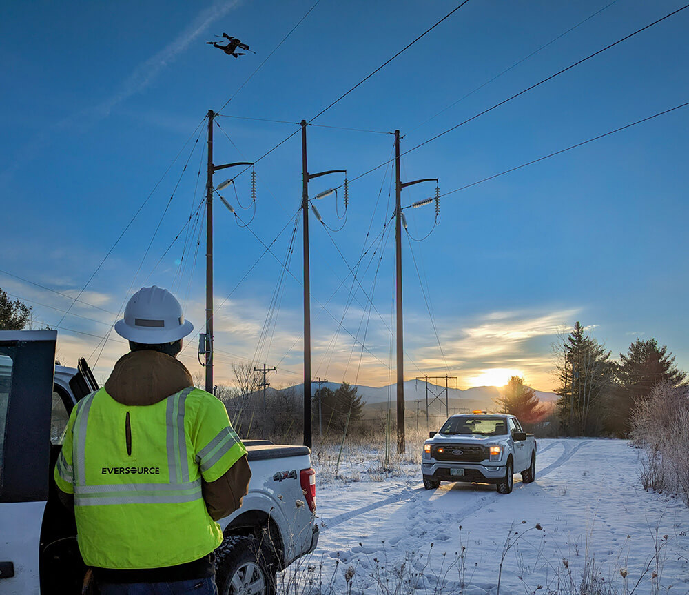 Eversource Energy employee ready's Censys Technology drone for utility inspection.