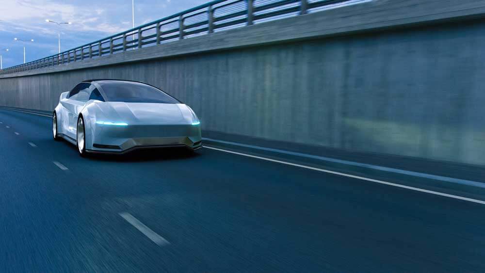 An electric car cruising on highway,